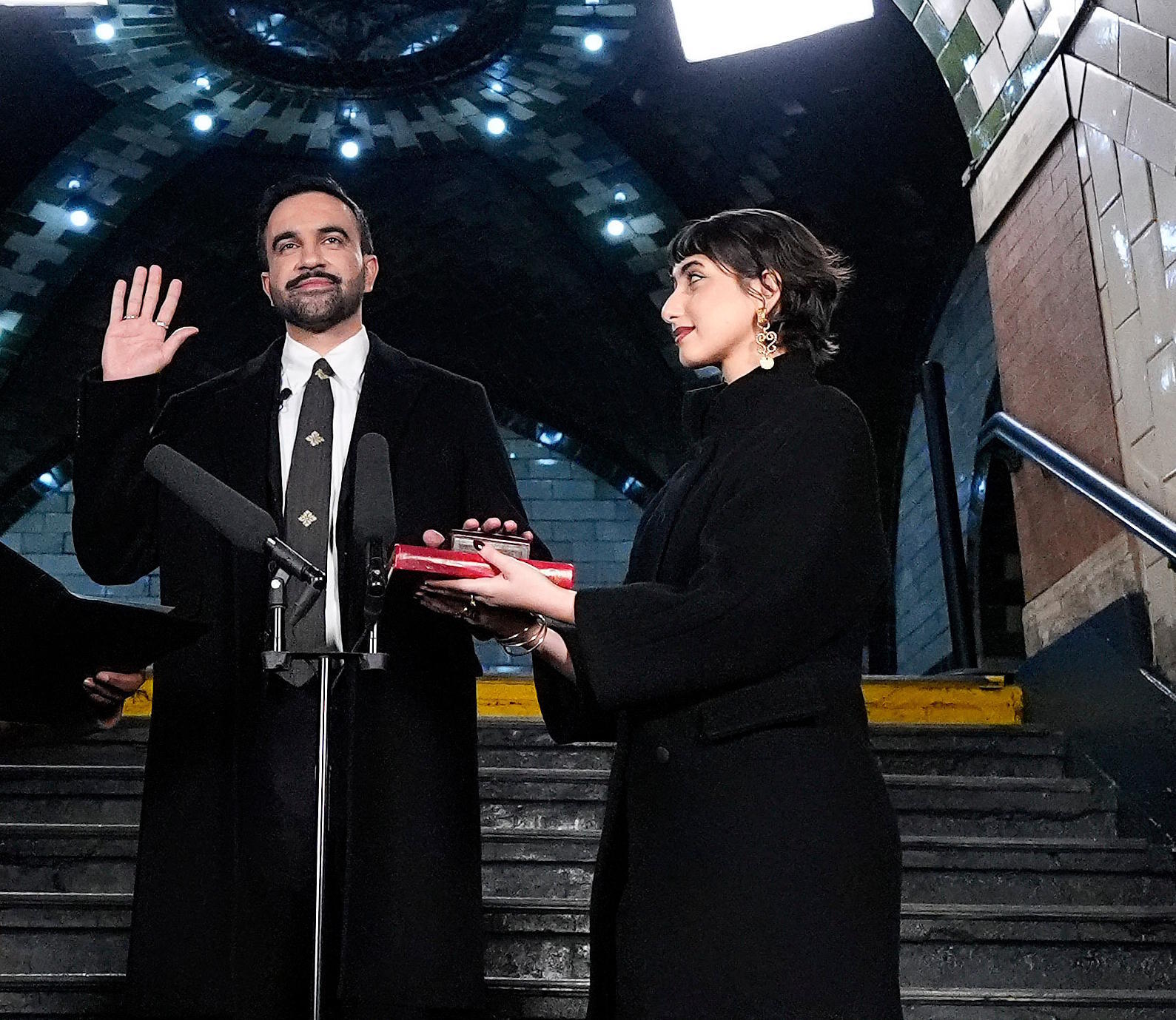 Mayor-elect Zohran Mamdani, center, as his wife Rama Duwaji.