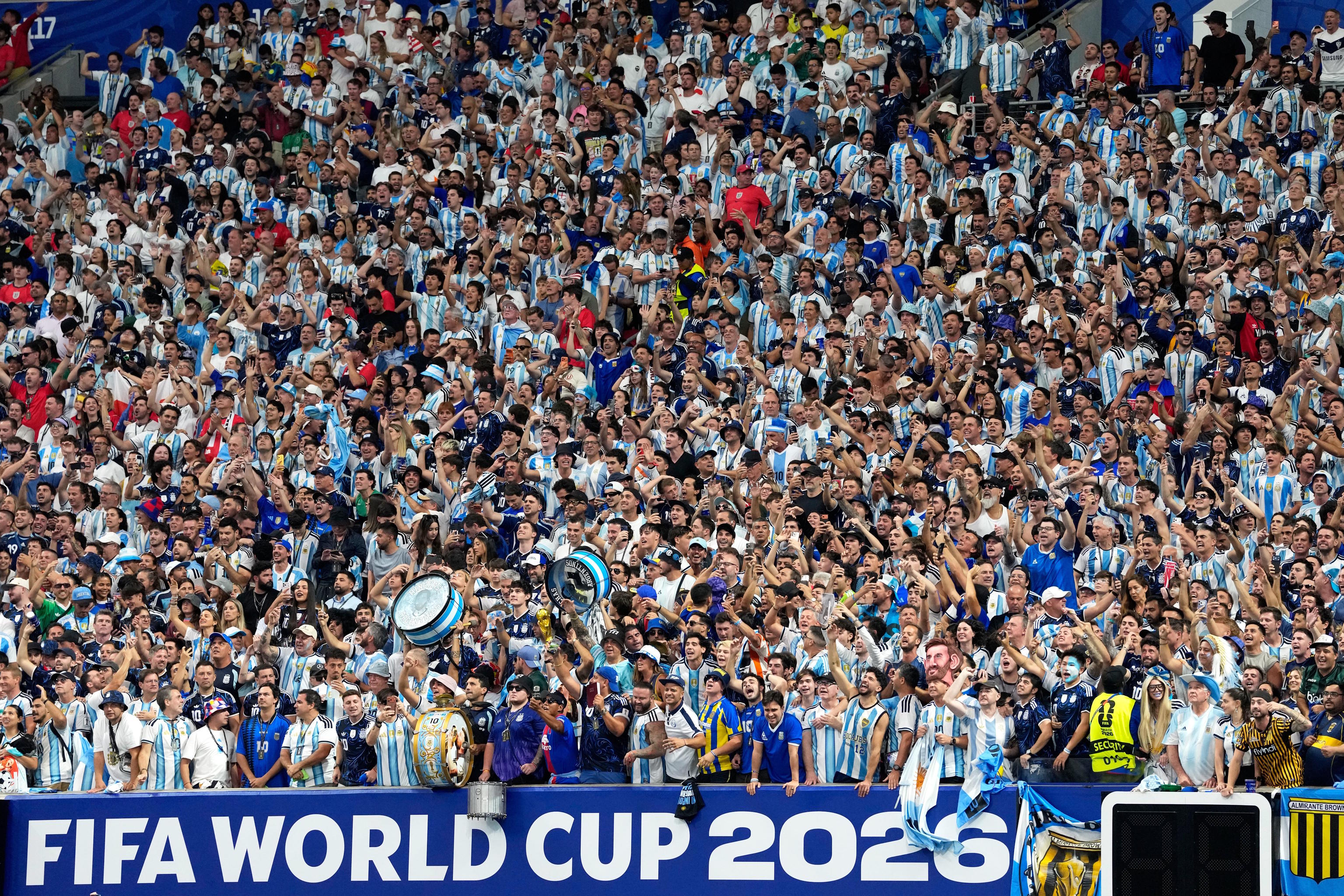 Argentine fans cheer on their national team.