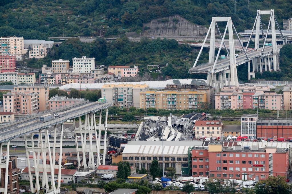 Cars are blocked on the Morandi highway bridge after a section of it collapsed