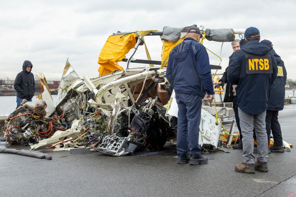NTSB team surveys the wreckage Recovered from the helicopter that crashed into Hudson River