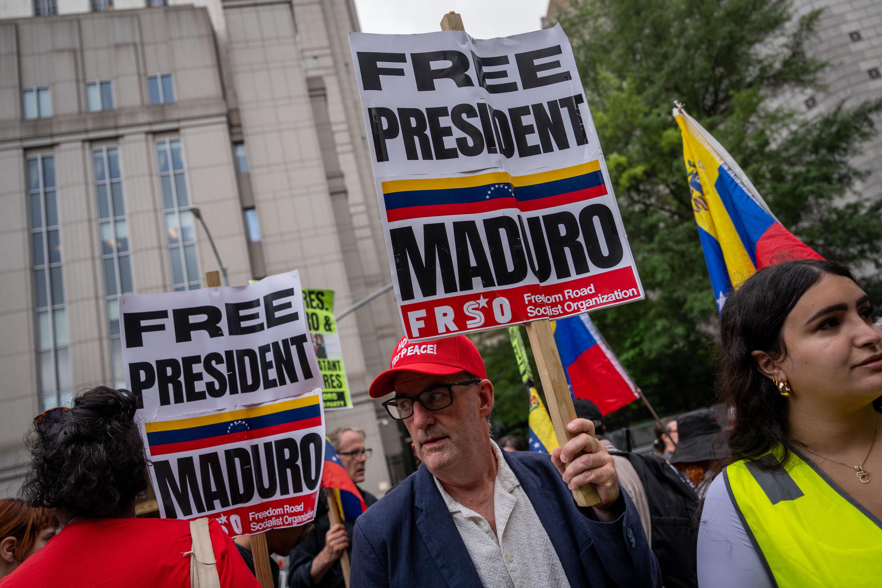 People protest in support of former Venezuela President Maduro and his wife.