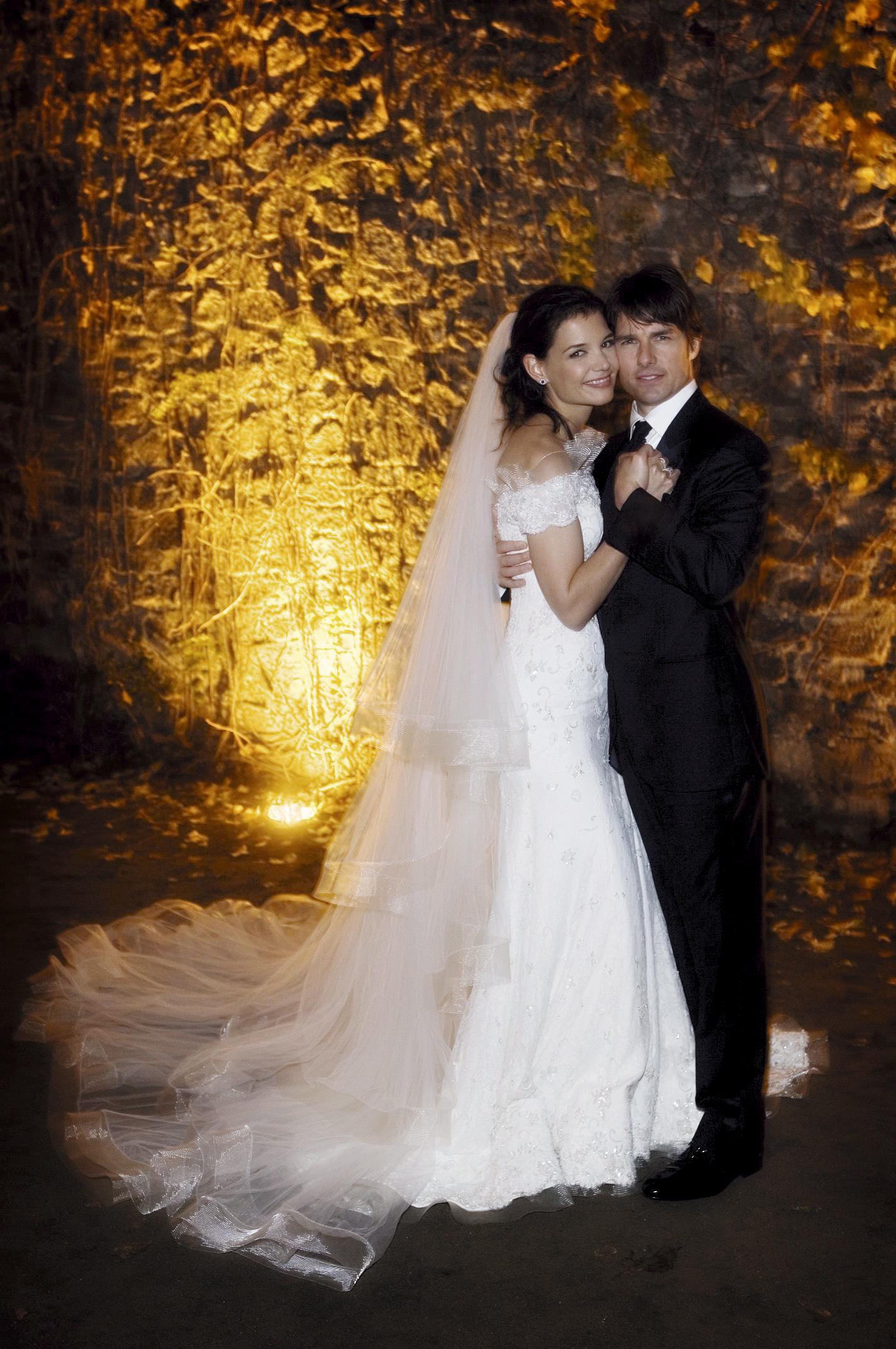 Tom Cruise and actress Katie Holmes pose in their wedding attire in 2006.