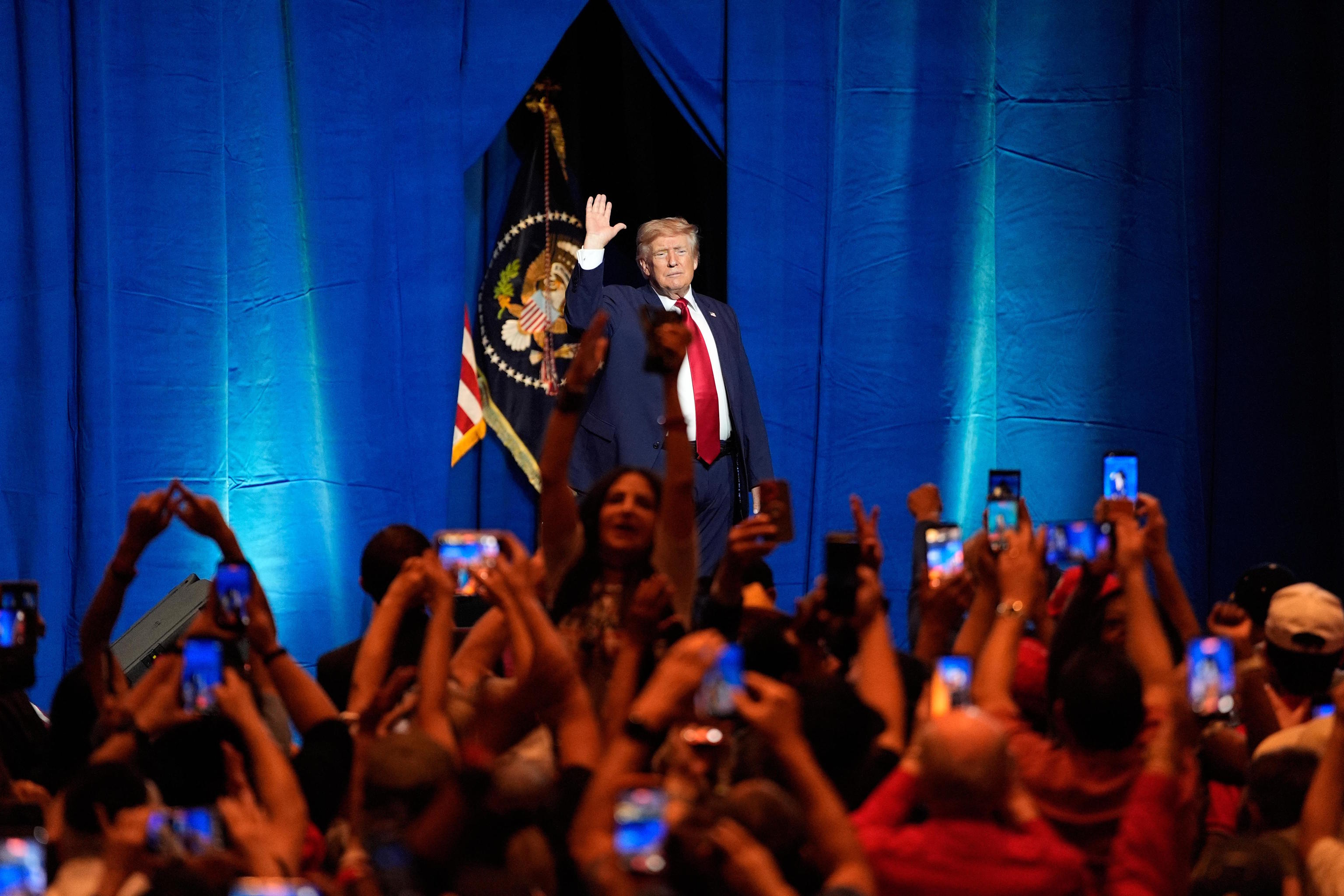 President Trump waves after speaking at an event at the Red Rock Casino Resort and Spa in Las Vegas.