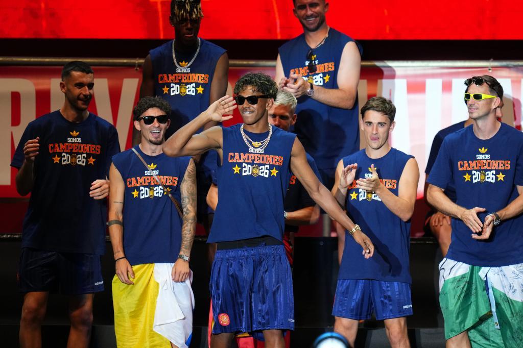 Spain's Lamine Yamal reacts during celebrations with his national team teammates
