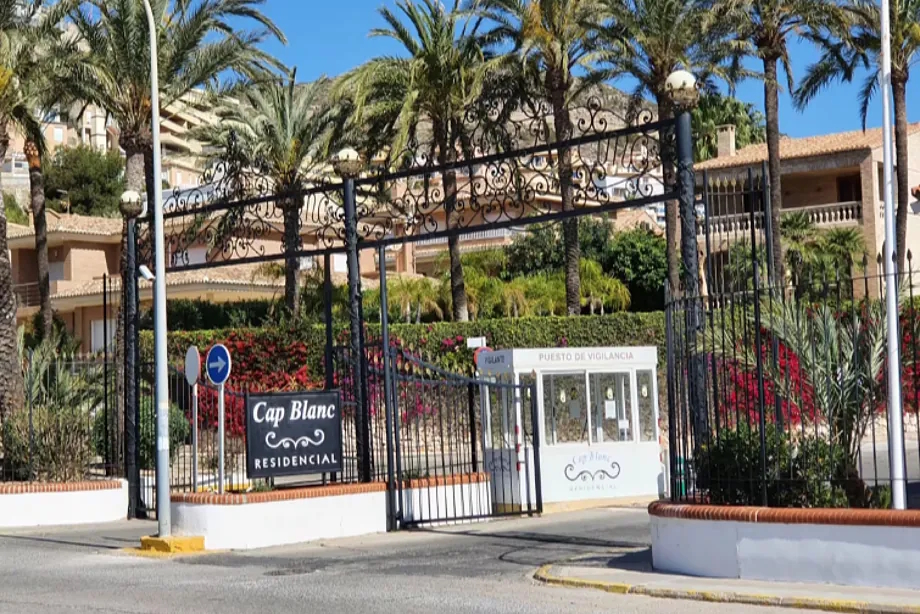 Entrance to the housing development where the deaths occurred