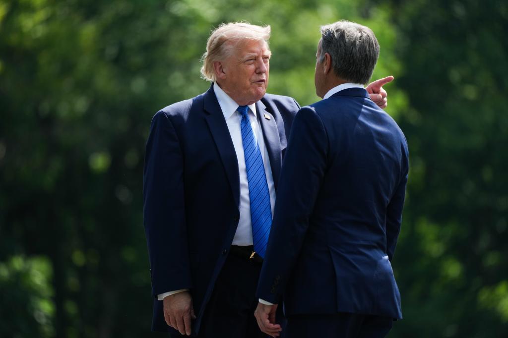 President Donald Trump, left, and CIA Director John Ratcliffe