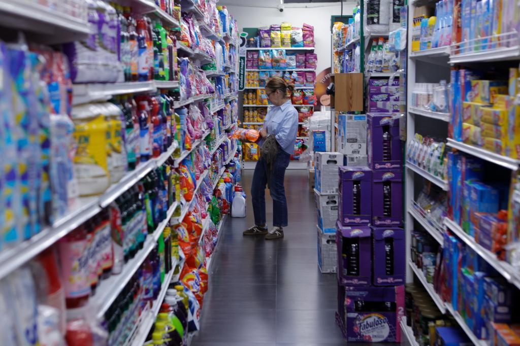 A woman shops at a supermarket.