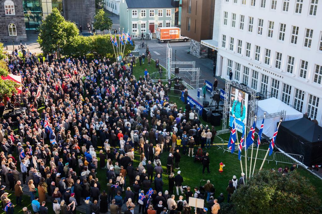 People gather for an "Afram Island," "Forward, Iceland," rally opposing the resumption of European Union accession