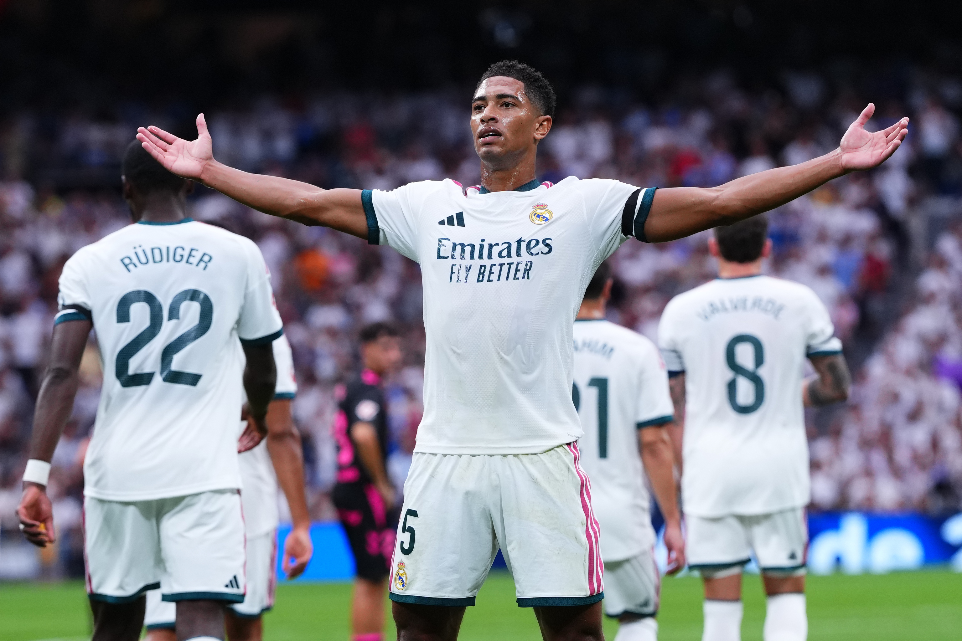 Real Madrid's Jude Bellingham celebrates after Malaga's own goal.