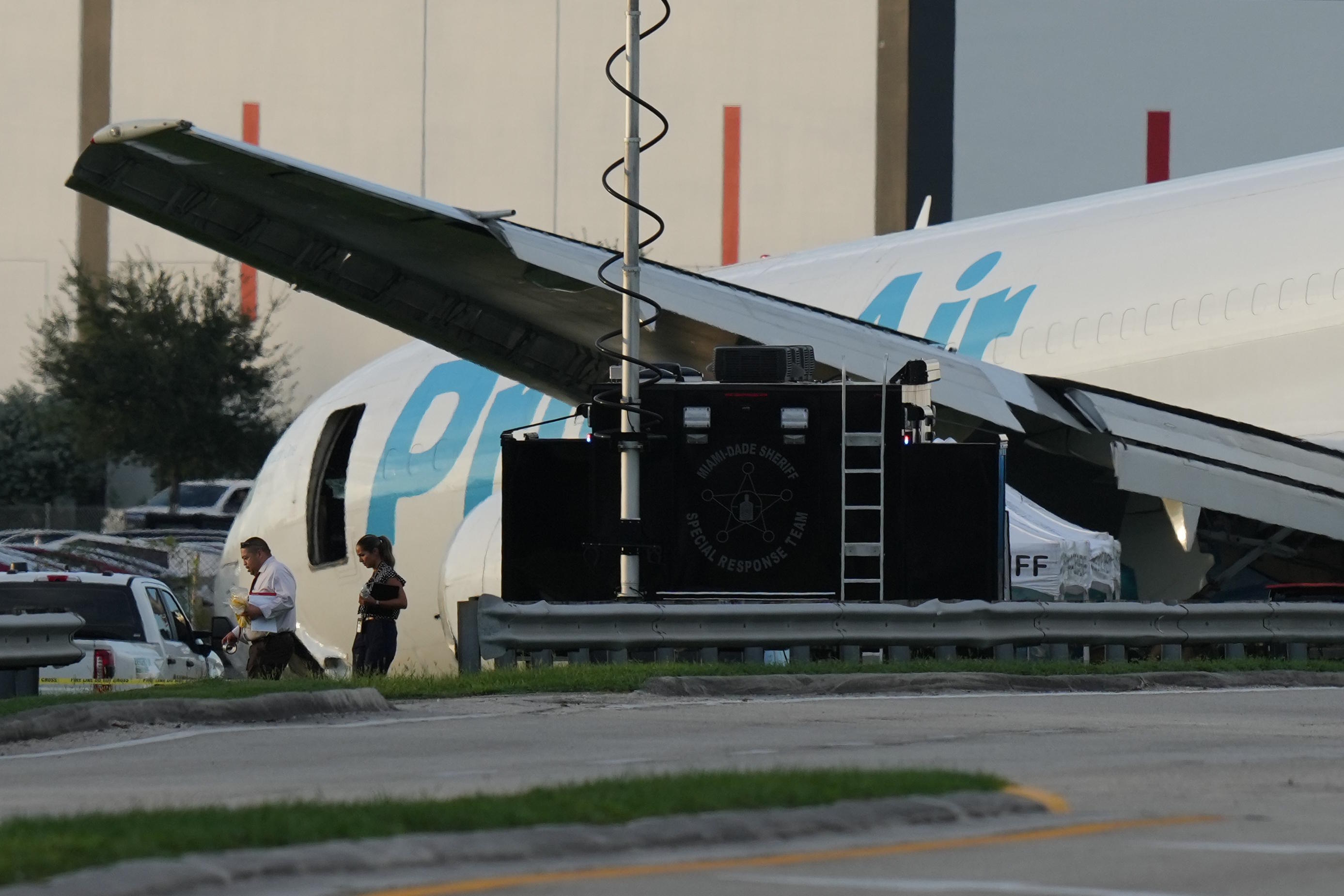 An Amazon cargo plane sits at the Miami International Airport after it overshot the runway.