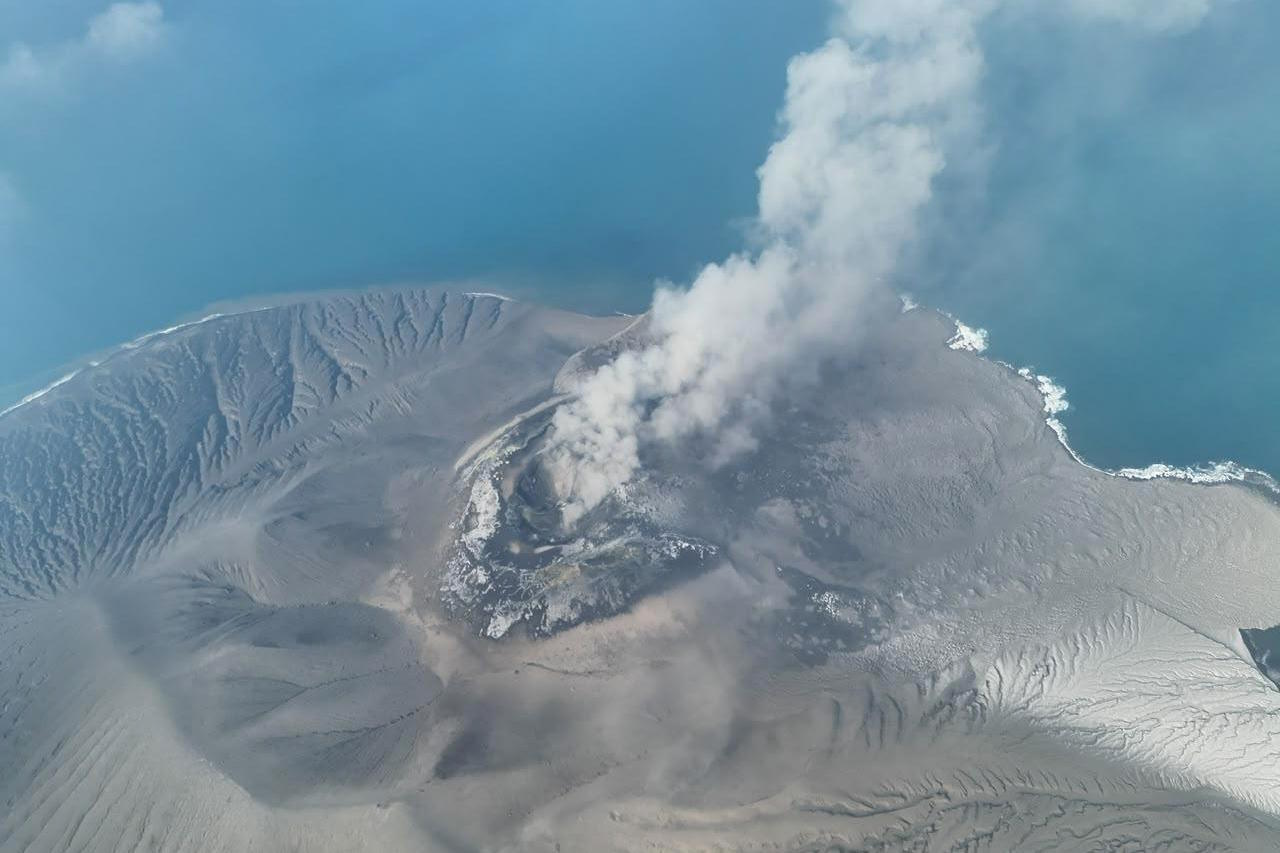 Mount Anak Krakatau spews volcanic smoke in Sunda Strait, Indonesia.