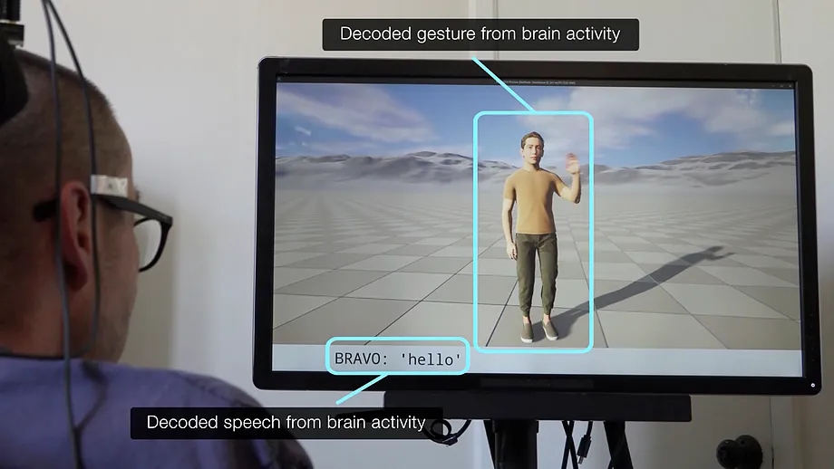 A patient facing their avatar, communicating words and gestures.