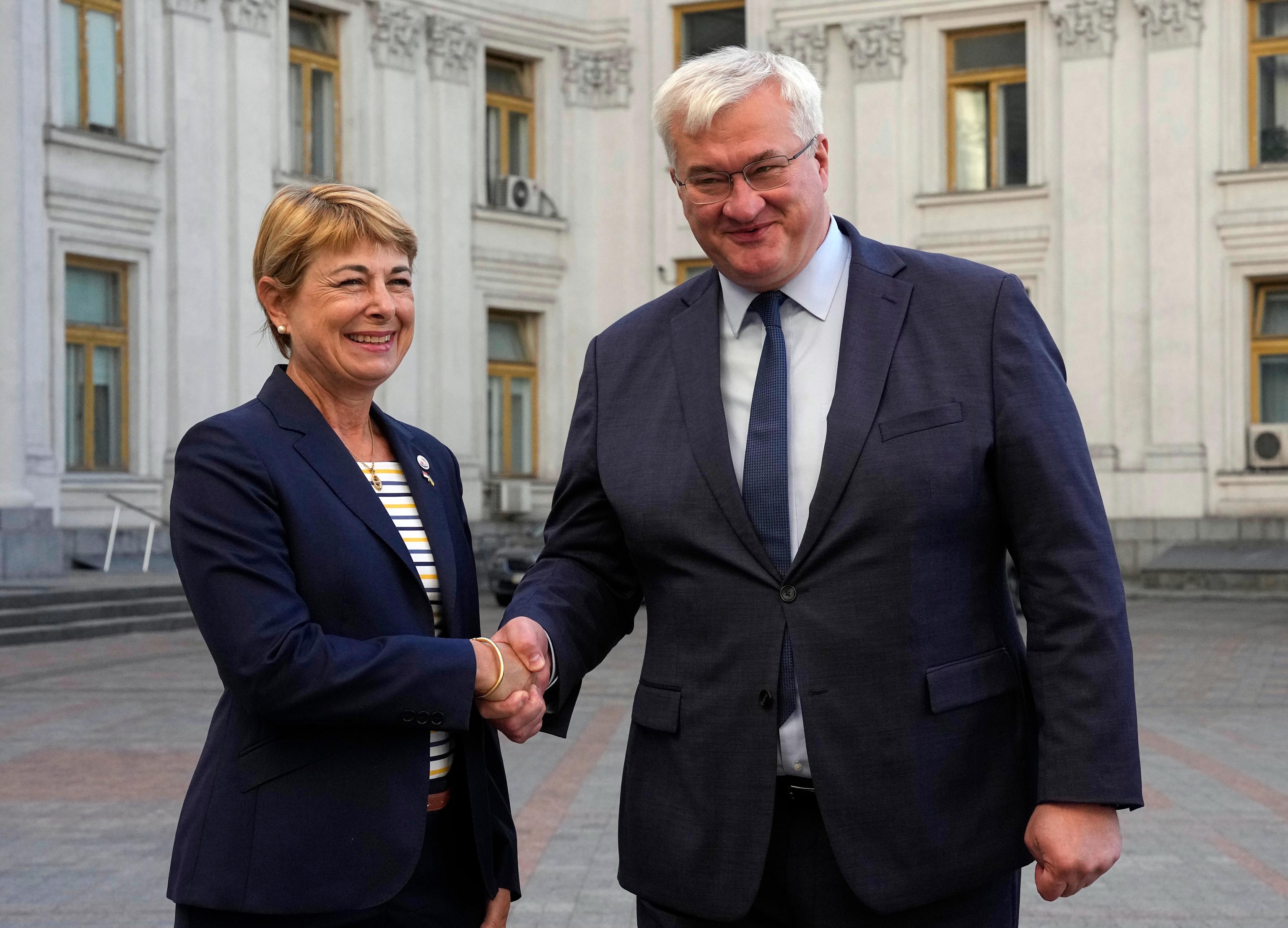Monaco's Foreign Minister Isabelle Berro-Amadei, left, and Ukrainian Foreign Minister Andrii Sybiha.
