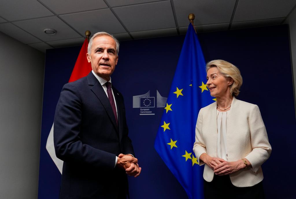 Canadian Prime Minister Mark Carney left, and European Commission President Ursula von der Leyen