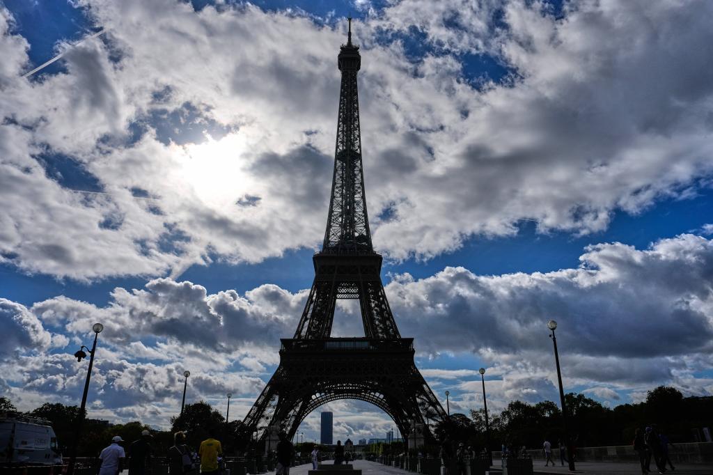 The Eiffel Tower reopens following a one-day strike over restrictions on women during a visit by a Hindu delegation