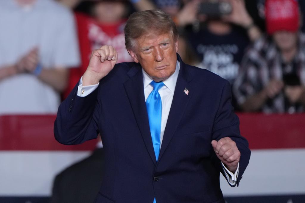 President Donald Trump dances at a campaign rally at the Pinnacle Bank Expo Center