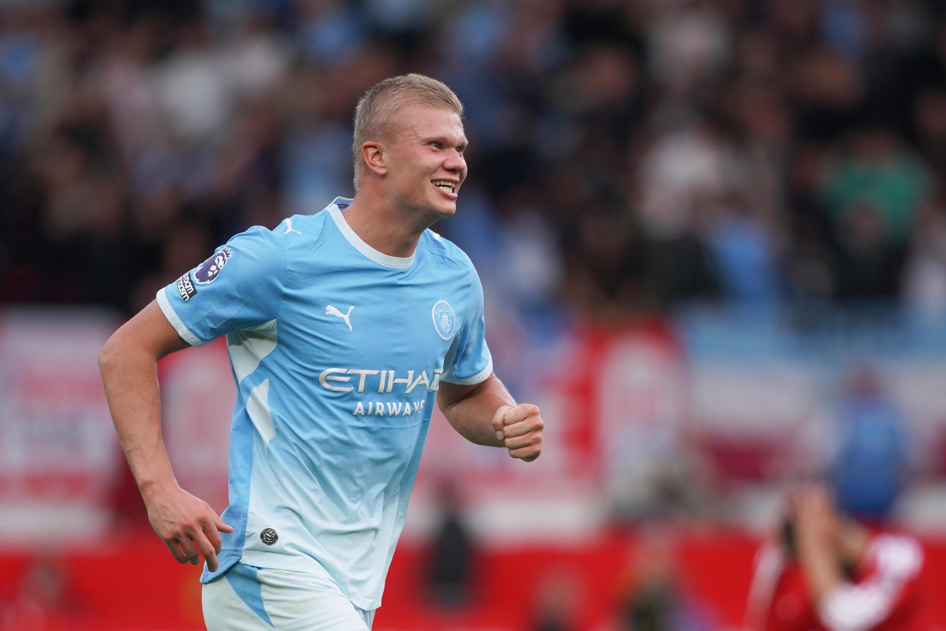 Haaland celebrates his goal against Manchester United.