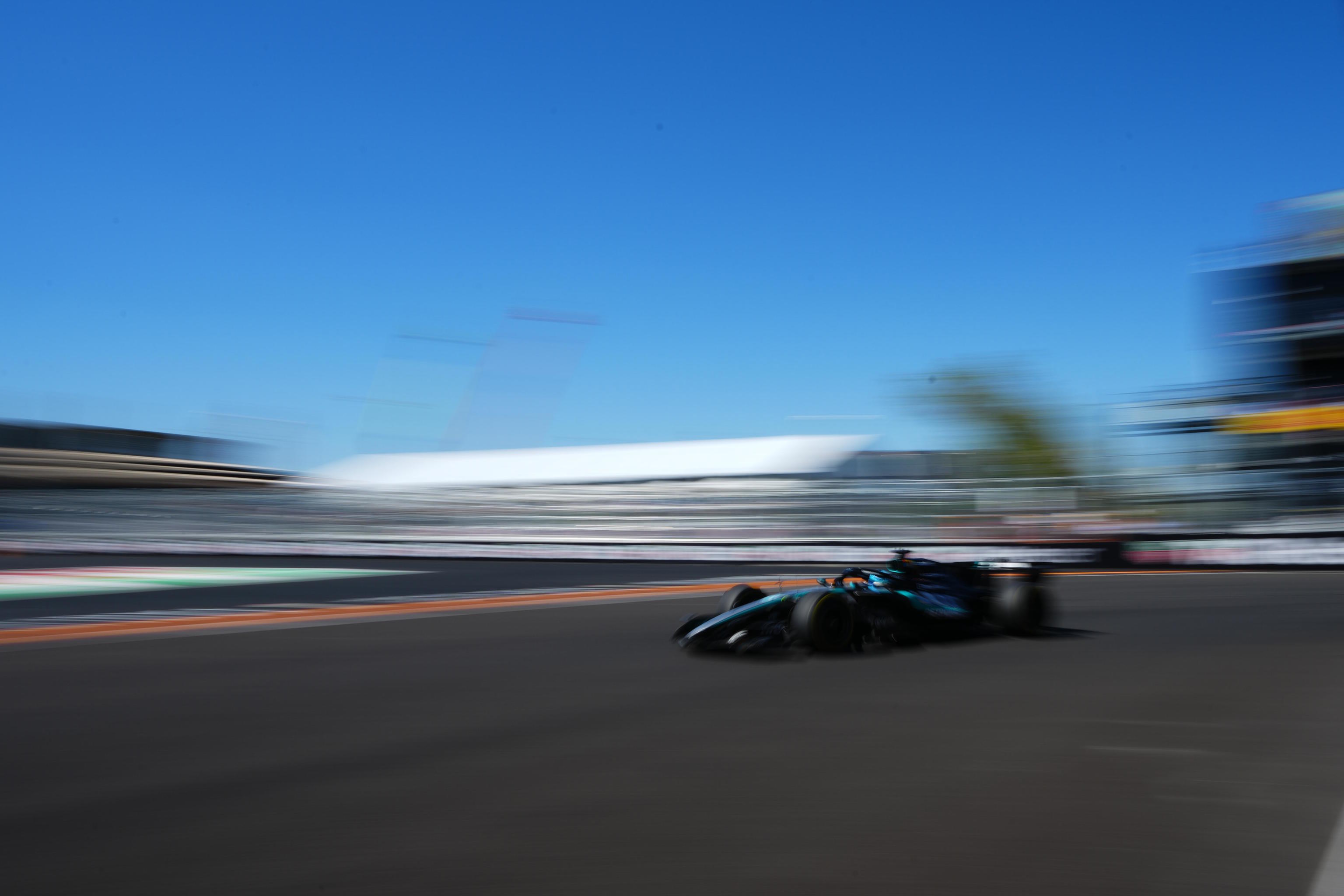 Mercedes driver George Russell of Britain steers his car in Madrid.
