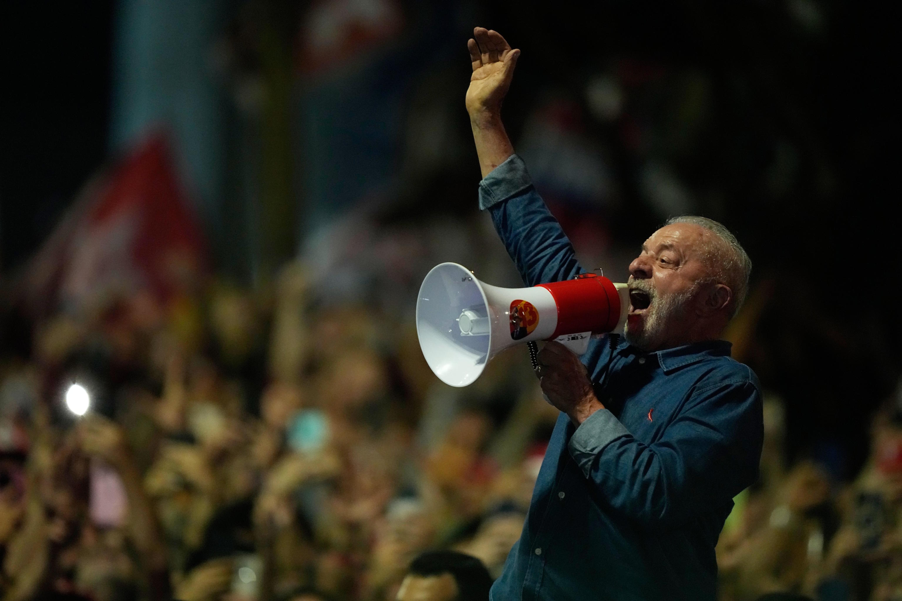 President Luiz Inacio Lula da Silva addresses supporters during a victory rally.