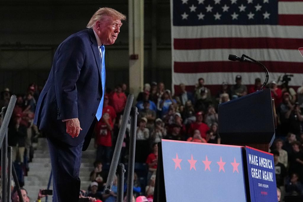 President Donald Trump looks into the crowd at a campaign rally at Crossroads Arena