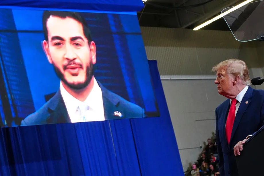 Trump observes an image of the Democratic Senate candidate from Michigan, Abdul El-Sayed, during a rally on Sunday.